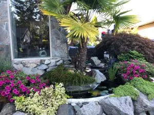 Visitors enjoying the serene beauty of Milner Gardens and Woodland in Qualicum Beach